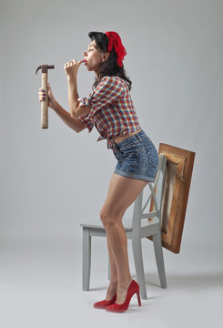 Girl with hammer .
