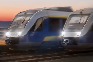 Fototapeta na wymiar two trains speeding in a sunset
