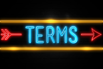 Terms  - fluorescent Neon Sign on brickwall Front view