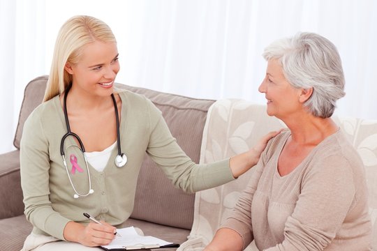 Composite image of doctor talking with her patient