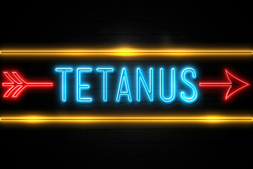 Tetanus  - fluorescent Neon Sign on brickwall Front view