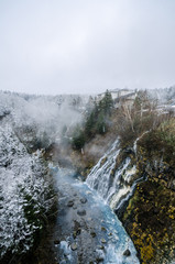Shirogane hot spring village of Biei City, stands this 30m tall waterfall. The water flowing down the gaps between the rocks resembles a white beard, earning it the name Shirohige (white beard).
