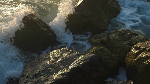Slow motion sea waves crashing. Close-up shot.
