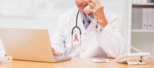 Composite image of close-up of prostate cancer awareness ribbon 