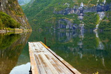 mountain lake with a bridge