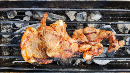 grilling thin pork chops on flame