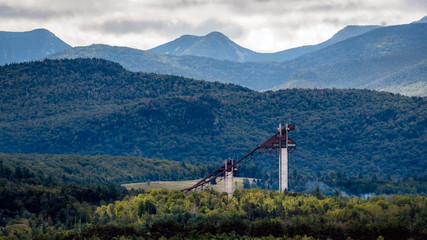 A long view of the Olympic ski jumps as part of the Lake Placid Olympic Sports Complex in the...