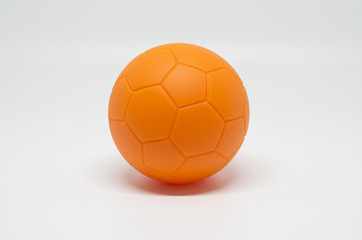 Orange football on white background 