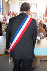 a french mayor during a wedding celebration