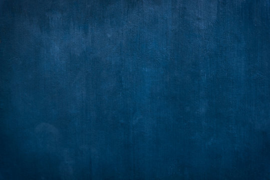 Grunge Blue painted on cement background and texture