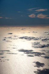 A view of the earth with clouds and the surface of the stratosphere