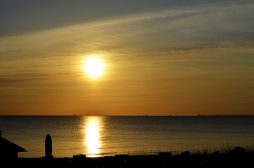 Naklejka na ściany i meble Morning sun at the seaside from Usedom, Germany