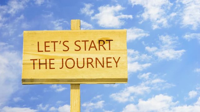 Motivational quote to create future. Let's start the journey. Words on a wooden sign against time lapse clouds in the blue sky. 