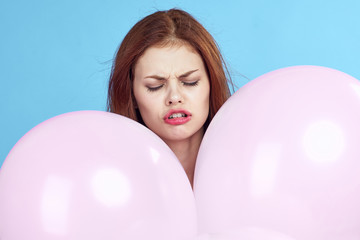 young woman, pink balloons, portrait, emotions