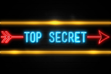 Top Secret  - fluorescent Neon Sign on brickwall Front view