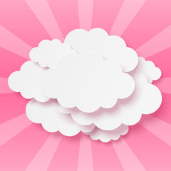 Paper clouds on pink background