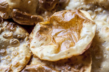 Indian snack PURI close up.