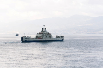 Fototapeta na wymiar Ship in Strait of Messina, Mediterranean Sea, Italy, Calabria 