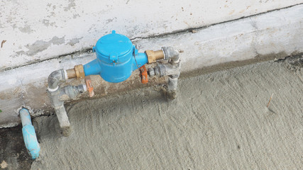 Valve of water plumbing set a front of house has copy space