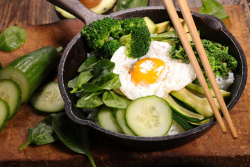 green vegetable with rice and egg
