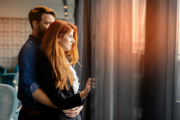 Romantic couple enjoying sunset