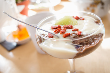 vegan chocolate pudding with chia and banana in glass