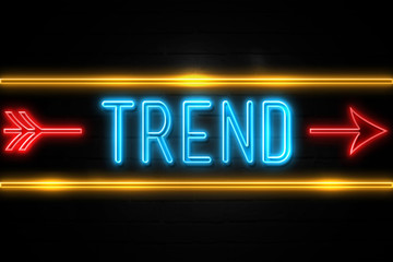 Obraz premium Trend - fluorescent Neon Sign on brickwall Front view