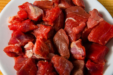 Finely chopped meat on a plate.