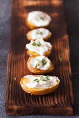Baked spicy potatoes with thyme on parchment