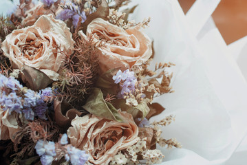 Bouquet of dried flowers, background blurred