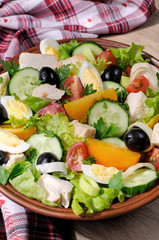 Vegetable salad with chicken and eggs