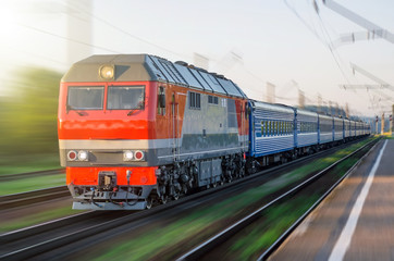Passenger diesel train traveling speed railway wagons journey light