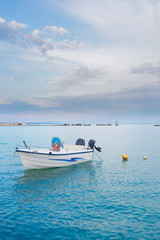 Fishing boat floating in water of Zaante town, beautiful detail of Zakinthos island, Greece