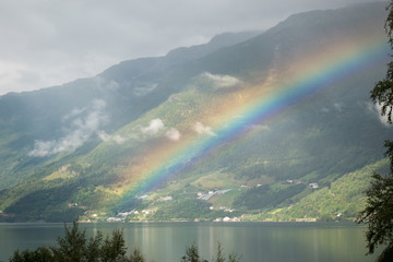 Rainbow above fjord in Norway
