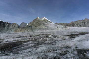 Perfect view of Allalinhorn and the Hohlaubgrat in the Swiss Alps with a glacier in the foreground