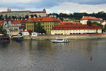Obraz premium Panorama of Lesser Town and river Vltava in sunny day. Prague, The Czech Republic
