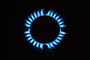 Gas burner on stove.