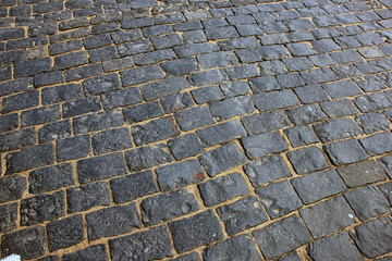 Fototapeta premium dark grey granite cobblestones on Red square in Moscow