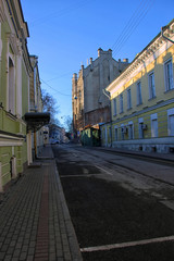 deserted quiet Moscow street in early morning in summer without people and cars