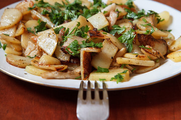 Fried potatoes with bacon and parsley II
