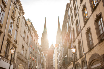 Street view with cathedral during the morning light in Clermont-Ferrand city in central France