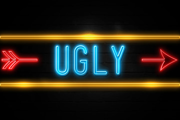 Ugly  - fluorescent Neon Sign on brickwall Front view