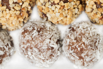 Chocolate donuts ball / View of chocolate donuts ball on white foam container.
