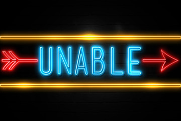 Unable  - fluorescent Neon Sign on brickwall Front view