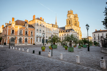 Fototapeta premium Sunset view on the old town with saint Croix cathedral in Orleans city in France