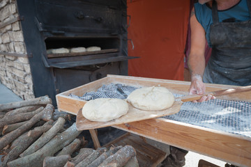 Drawers with prepared bread dough to be placed in the oven.