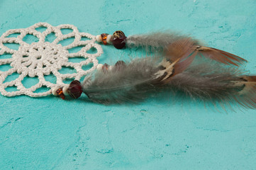 Dream catcher on aquamarine