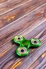 Close up shot of an green fidget spinner