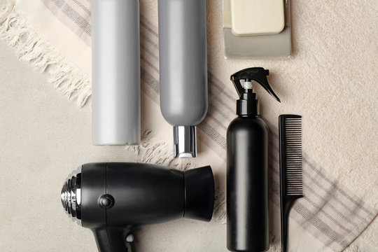 Composition with hair dryer on light background