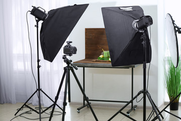 Professional photo equipment and composition with smoothie in studio. Concept of food photography